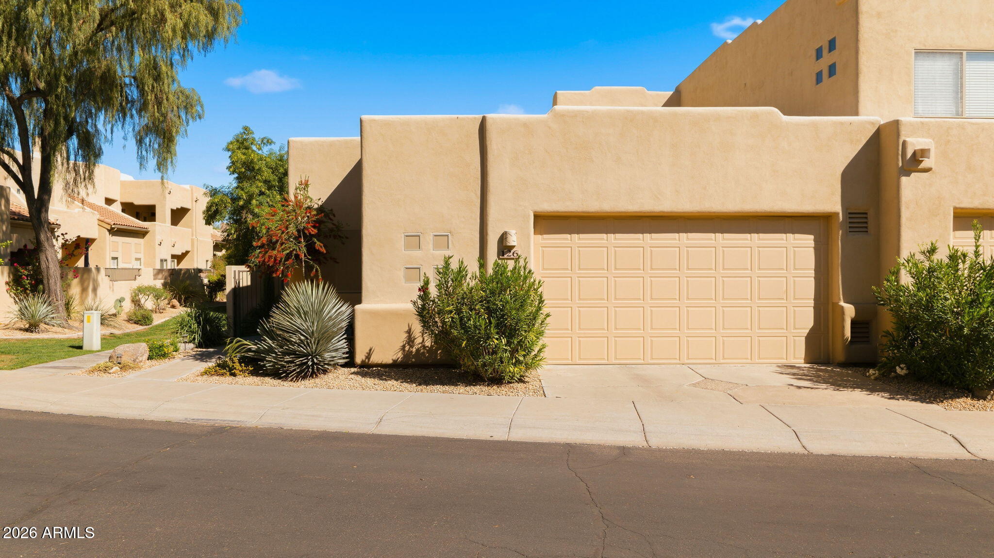 9065 East Gary Road, Unit 126 Scottsdale, AZ 85260 - Photo 35 of 37 a view of a house with a street