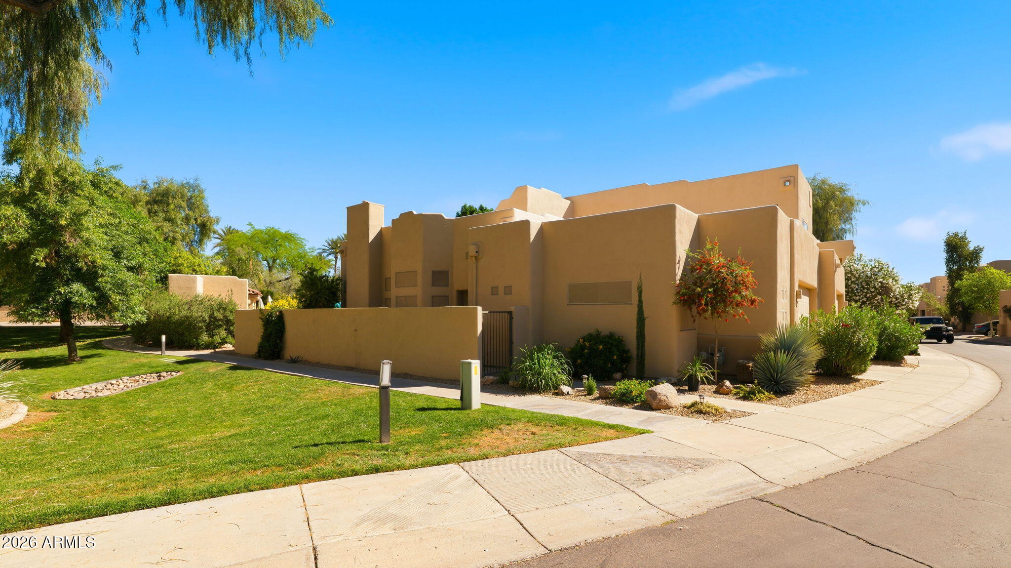 9065 East Gary Road, Unit 126 Scottsdale, AZ 85260 - Photo 37 of 37 a view of a street with a building in the background