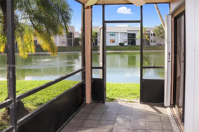 a bathroom with a glass door