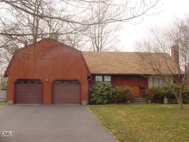 1375 Huntington Road Stratford, CT 06614 - Photo 1 of 1 a front view of house with a garden