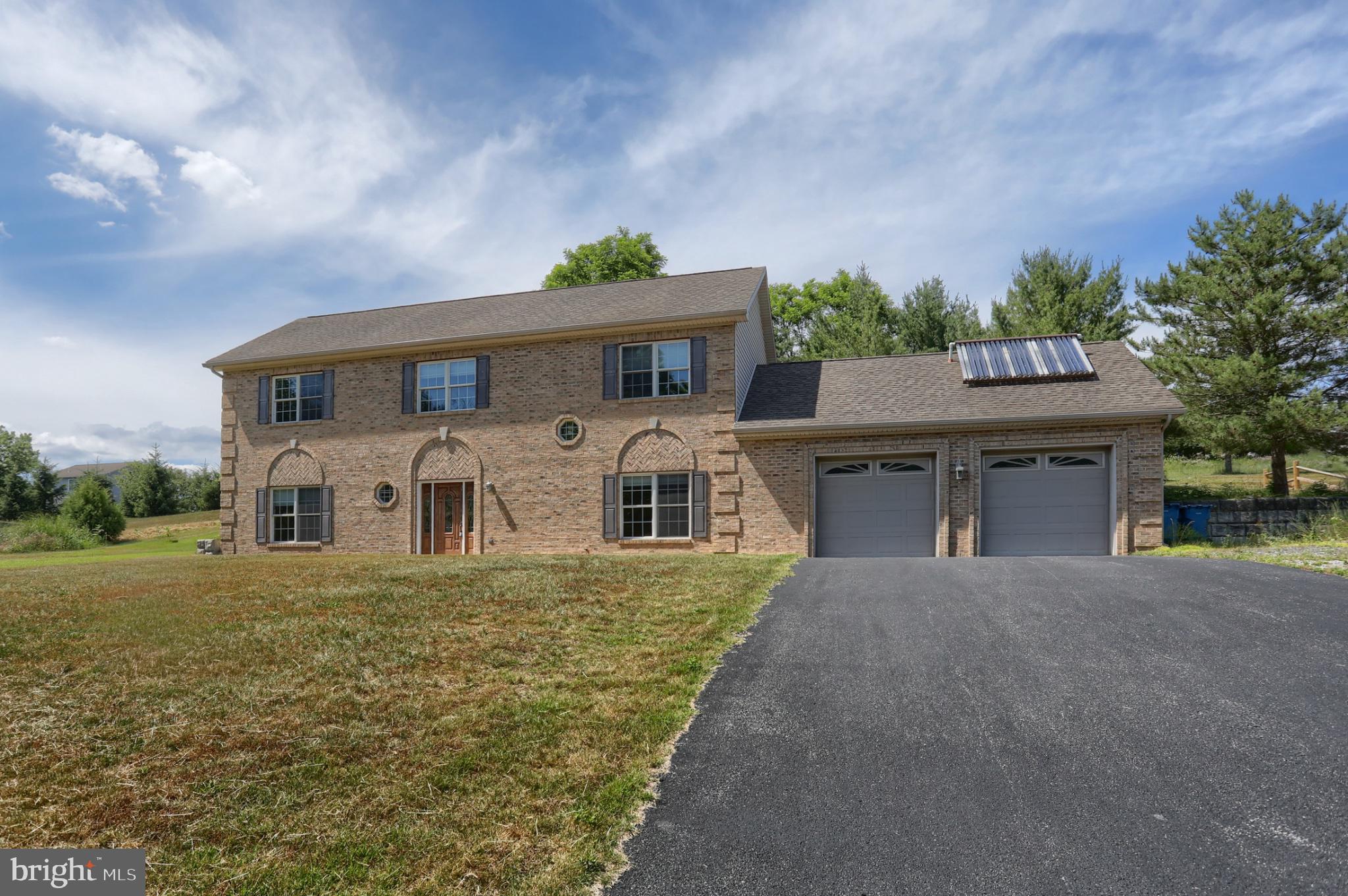 Charming brick home with scenic views.