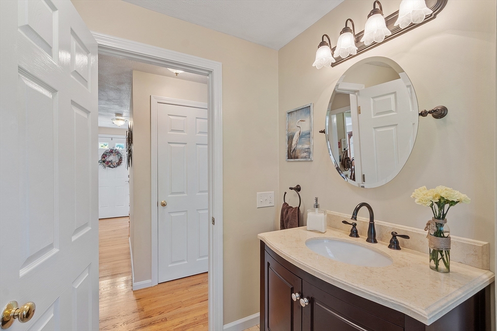 2 Oak Hill Road Haverhill, MA 01830 - Photo 21 of 42 a bathroom with a sink vanity and a mirror
