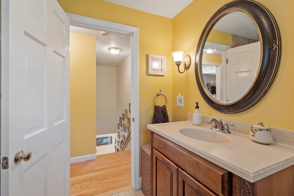 2 Oak Hill Road Haverhill, MA 01830 - Photo 33 of 42 a bathroom with a sink and a mirror