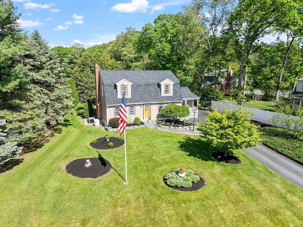 2 Oak Hill Road Haverhill, MA 01830 - Photo 4 of 42 a backyard of a house with yard and outdoor seating