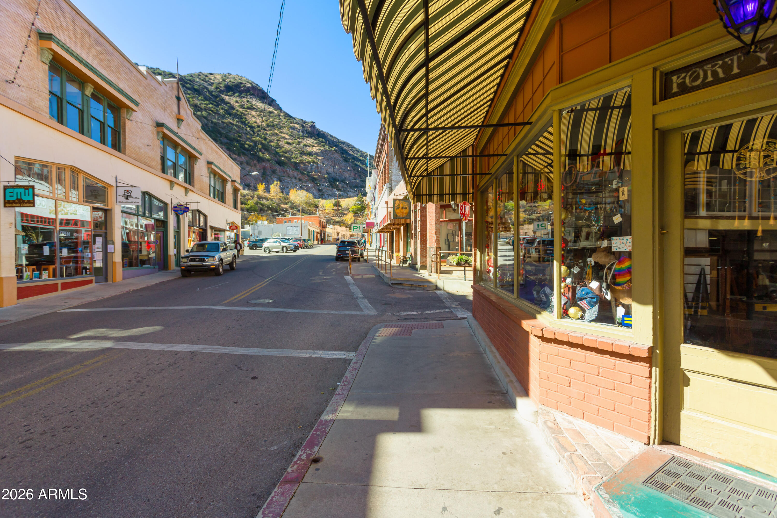 41 Main Street Bisbee, AZ 85603 - Photo 4 of 33 a city street lined with tall buildings