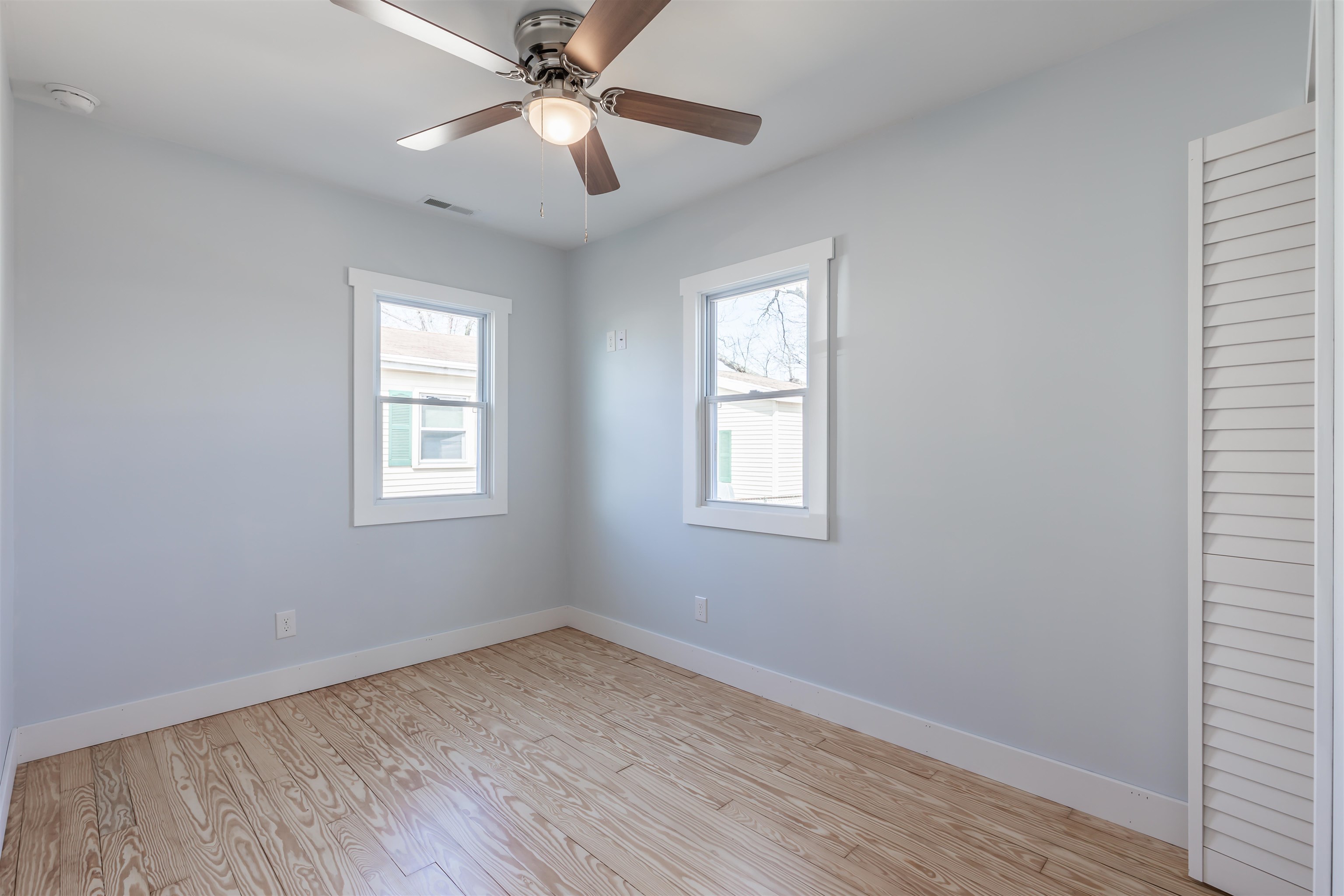 11 Vacation Road Villas, NJ 08251 - Photo 23 of 31 a view of empty room with wooden floor and fan