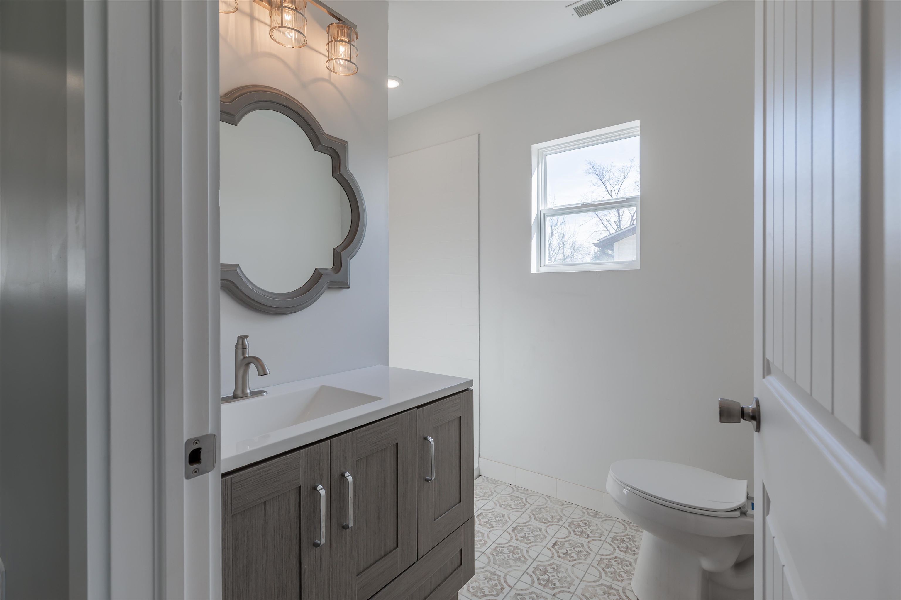 11 Vacation Road Villas, NJ 08251 - Photo 8 of 31 a bathroom with a sink a toilet and a mirror