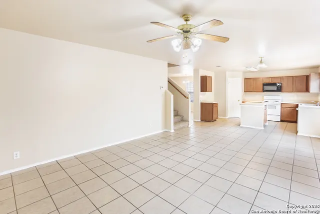 a view of a kitchen with a sink