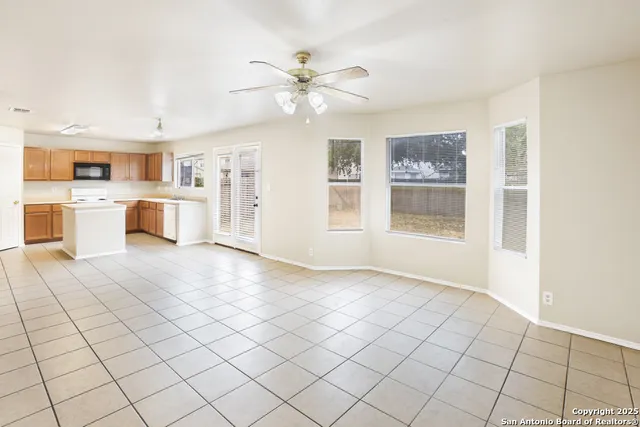 a view of a kitchen with furniture and a kitchen