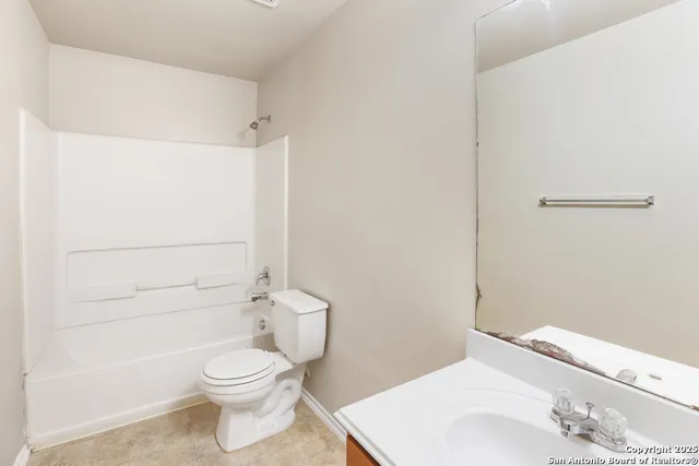 a view of outdoor space with wooden fence