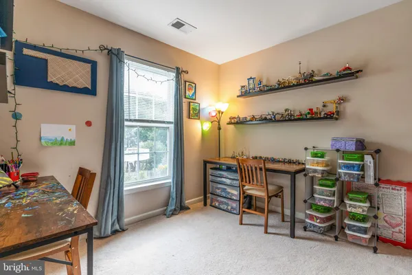 a room with furniture and a window