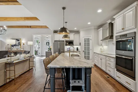 a workspace with furniture and wooden floor