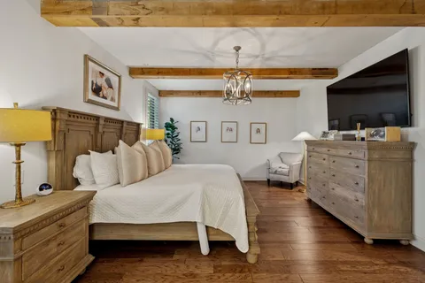 a living room with couch and a table