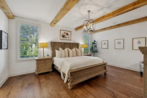 a bathroom with a granite countertop sink mirror and double