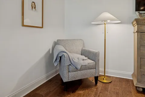 a bathroom with a shower sink and mirror
