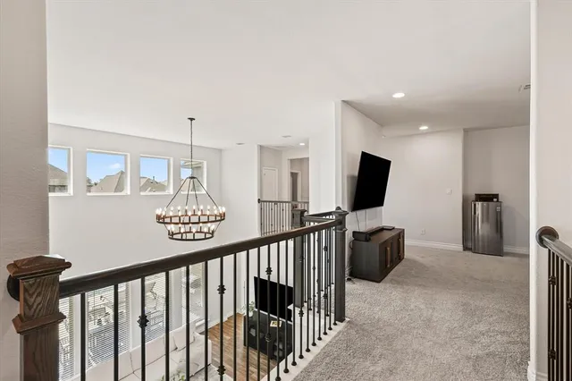 a view of a hallway with workspace