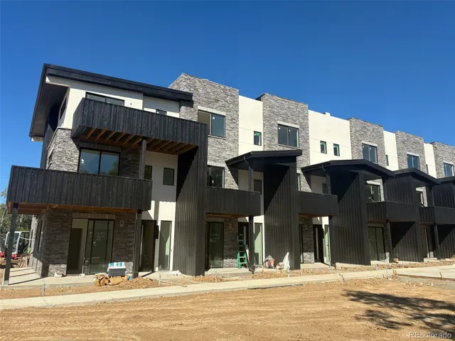 a view of a building with a street
