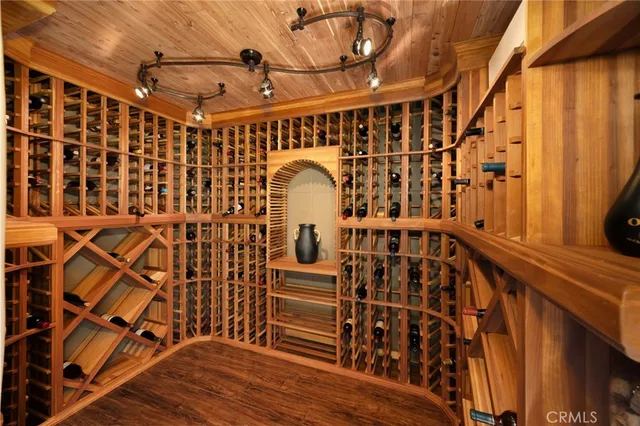 a view of a lush green hillside and a houses