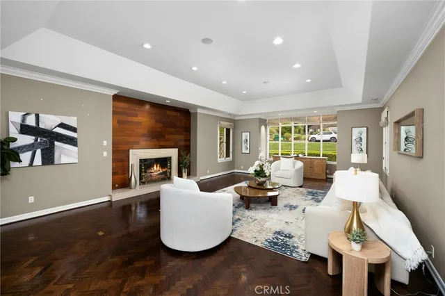 a living room with furniture or couch and a fireplace