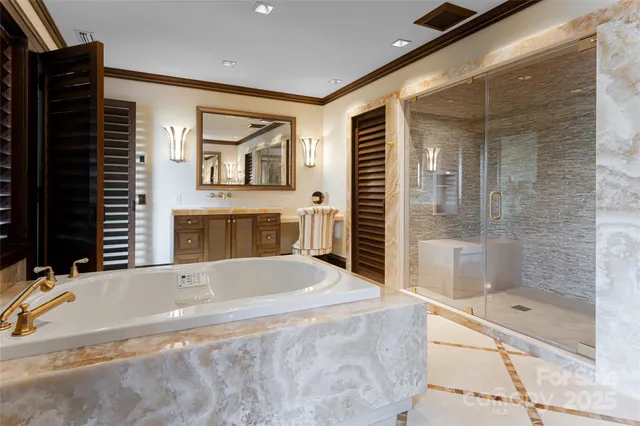 a bathroom with a bathtub and a shower