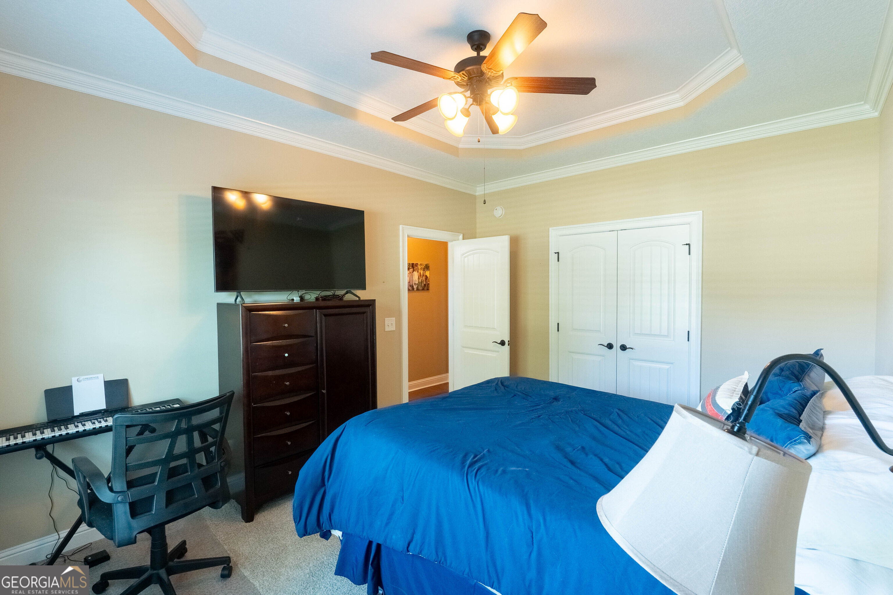 501 Old Bridge Road Warner Robins, GA 31088 - Photo 30 of 54 a bedroom with a bed and a flat screen tv