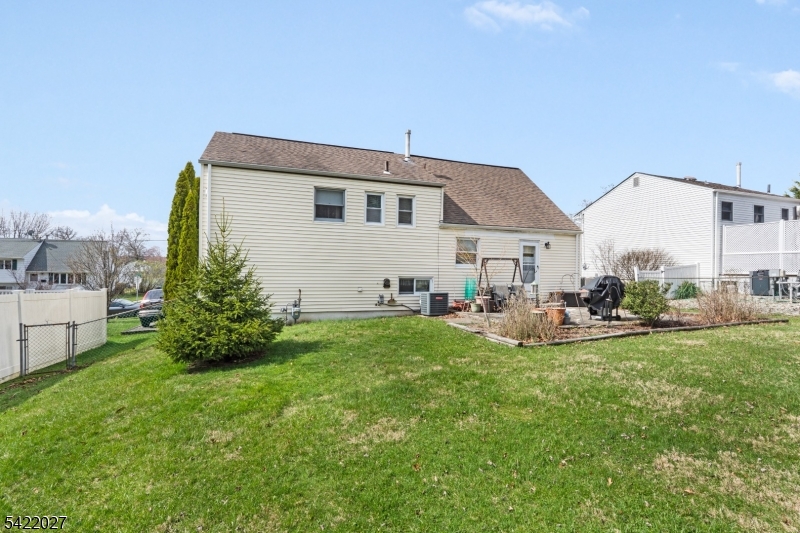 248 Perry Street Dover, NJ 07801 - Photo 3 of 24 a view of a house with backyard and sitting area