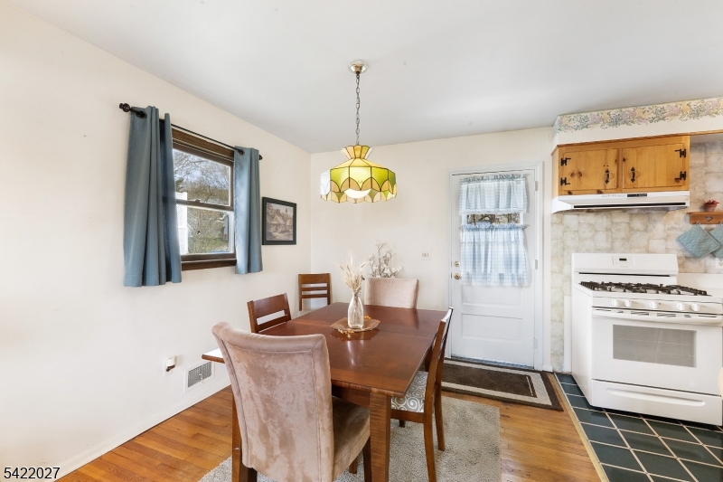 248 Perry Street Dover, NJ 07801 - Photo 9 of 24 a dining room with furniture and window