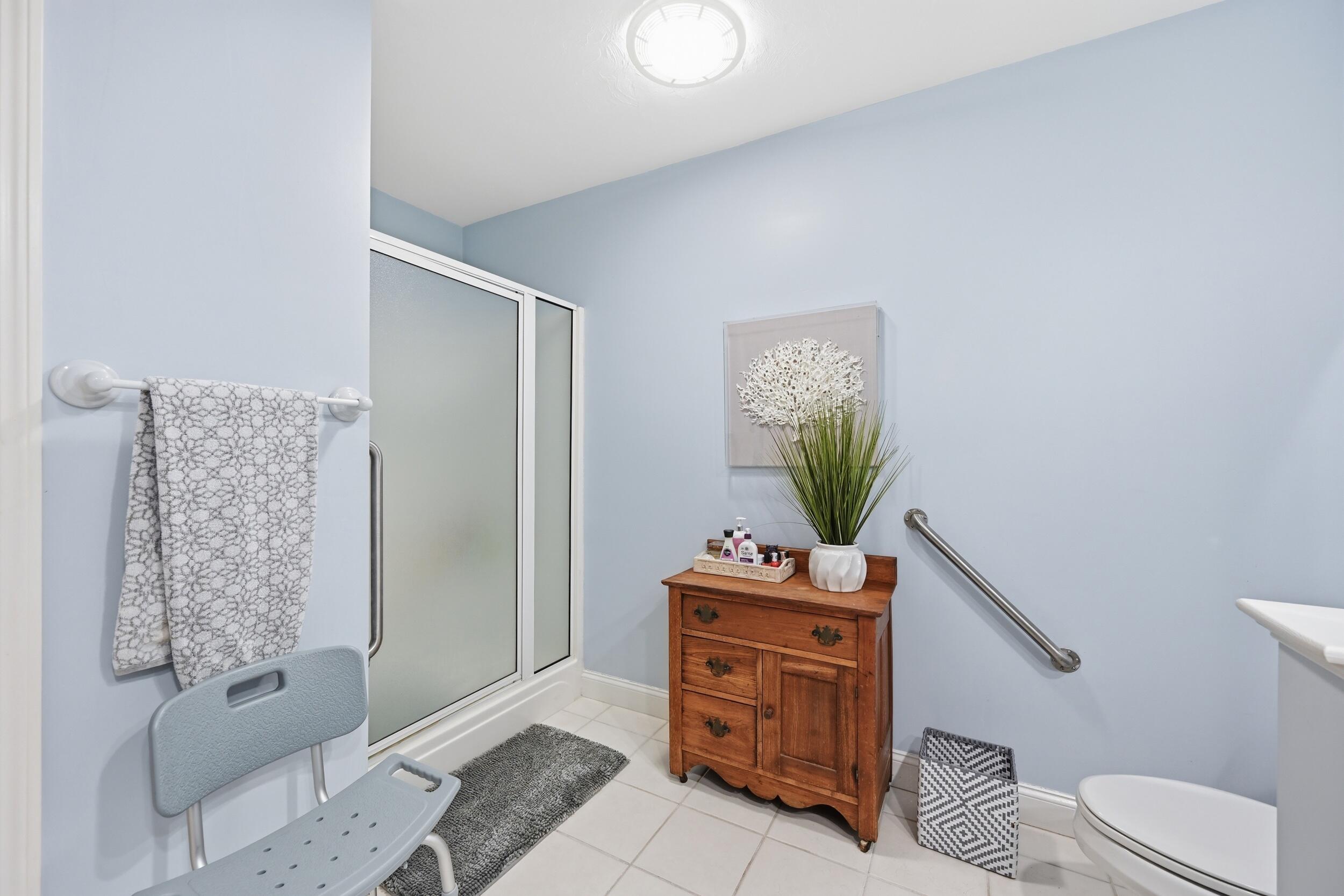 22 Stratford Ridge, Unit 22 Mashpee, MA 02649 - Photo 21 of 38 a living room with furniture and a window
