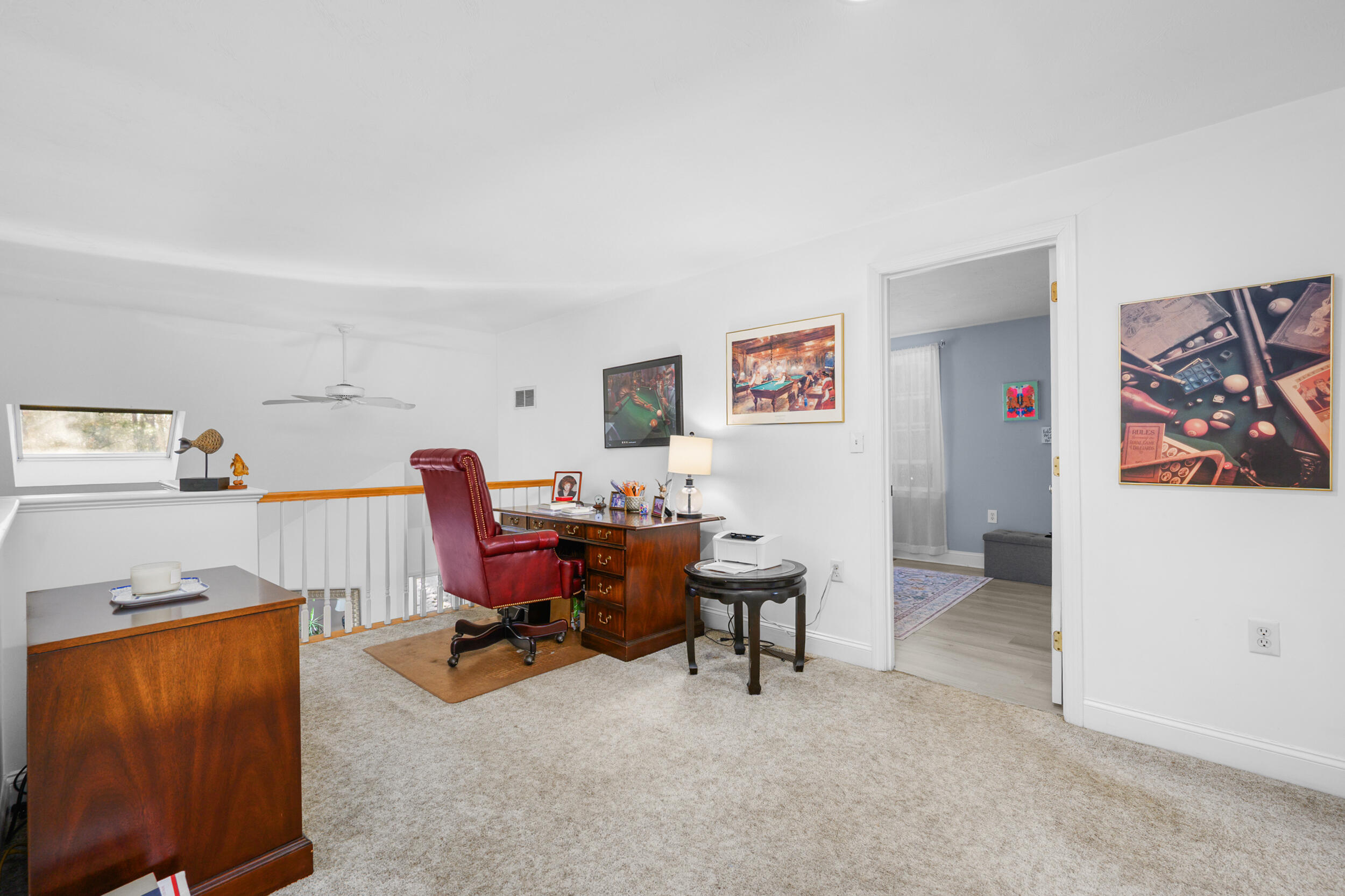 22 Stratford Ridge, Unit 22 Mashpee, MA 02649 - Photo 29 of 38 a workspace with furniture and a kitchen