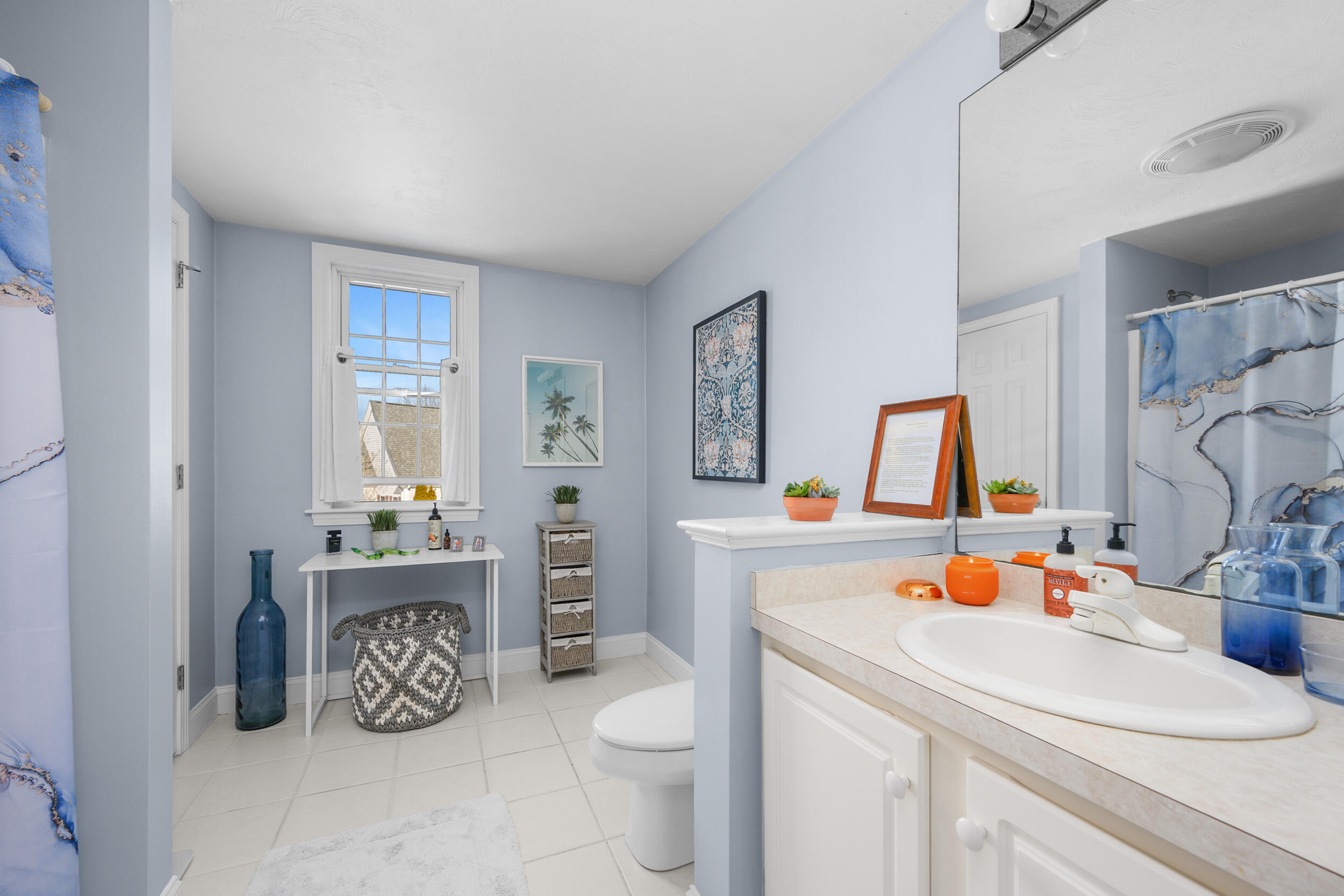 22 Stratford Ridge, Unit 22 Mashpee, MA 02649 - Photo 33 of 38 a bathroom with a sink toilet and mirror