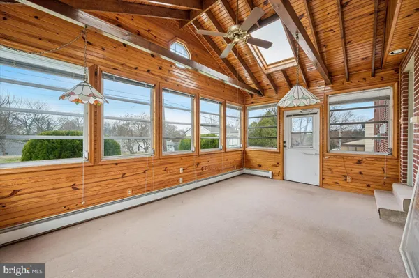 a view of an empty room with a balcony