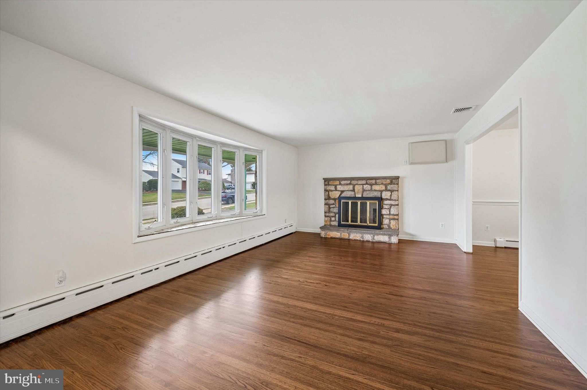 2008 Hemlock Road Jeffersonville, PA 19403 - Photo 4 of 32 wooden floor in an empty room with a window