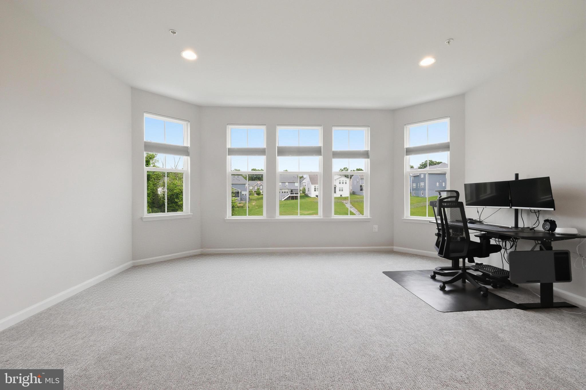 5707 Hawk Ridge Road Frederick, MD 21704 - Photo 39 of 109 a view of workspace with furniture and windows
