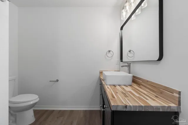 a bathroom with a sink and a toilet