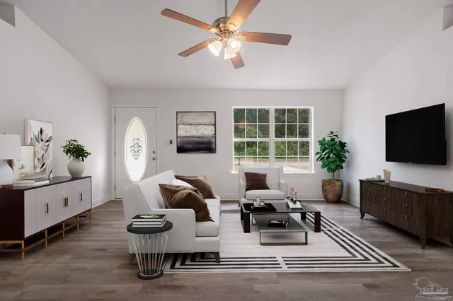 a living room with furniture and a flat screen tv