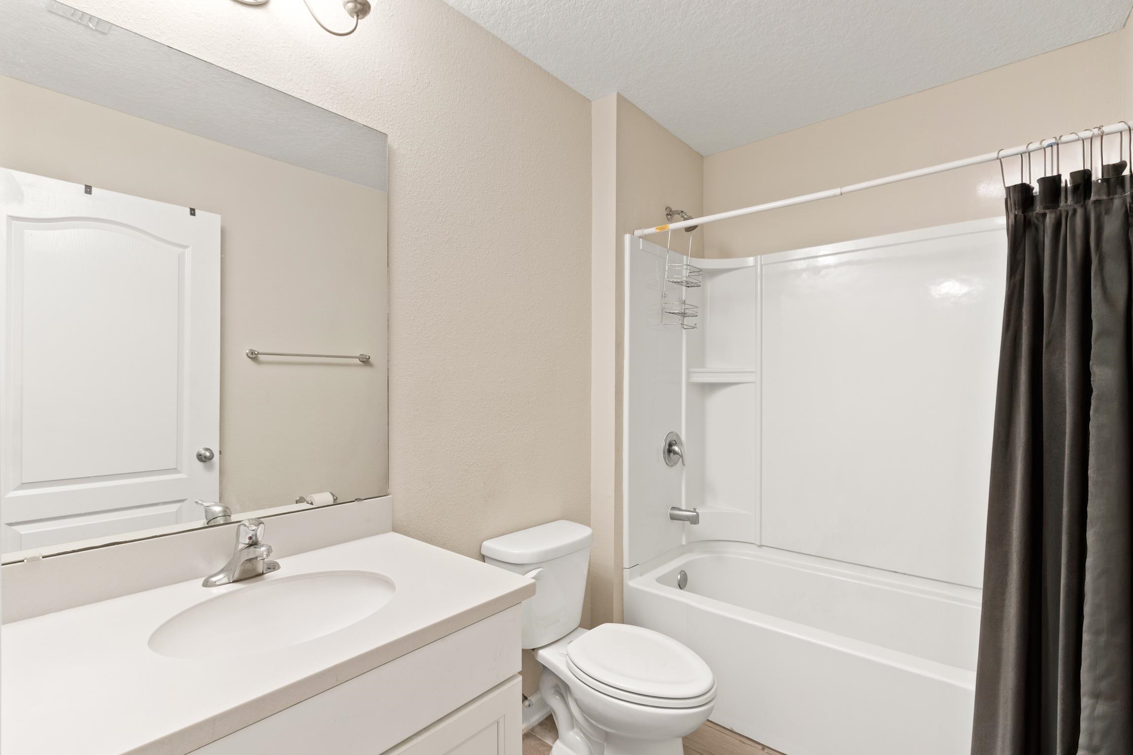 392 South Hamilton Springs Road St. Augustine, FL 32084 - Photo 23 of 29 a bathroom with a sink mirror toilet and bathtub