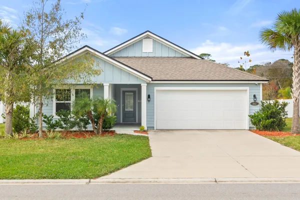 front view of house with a yard