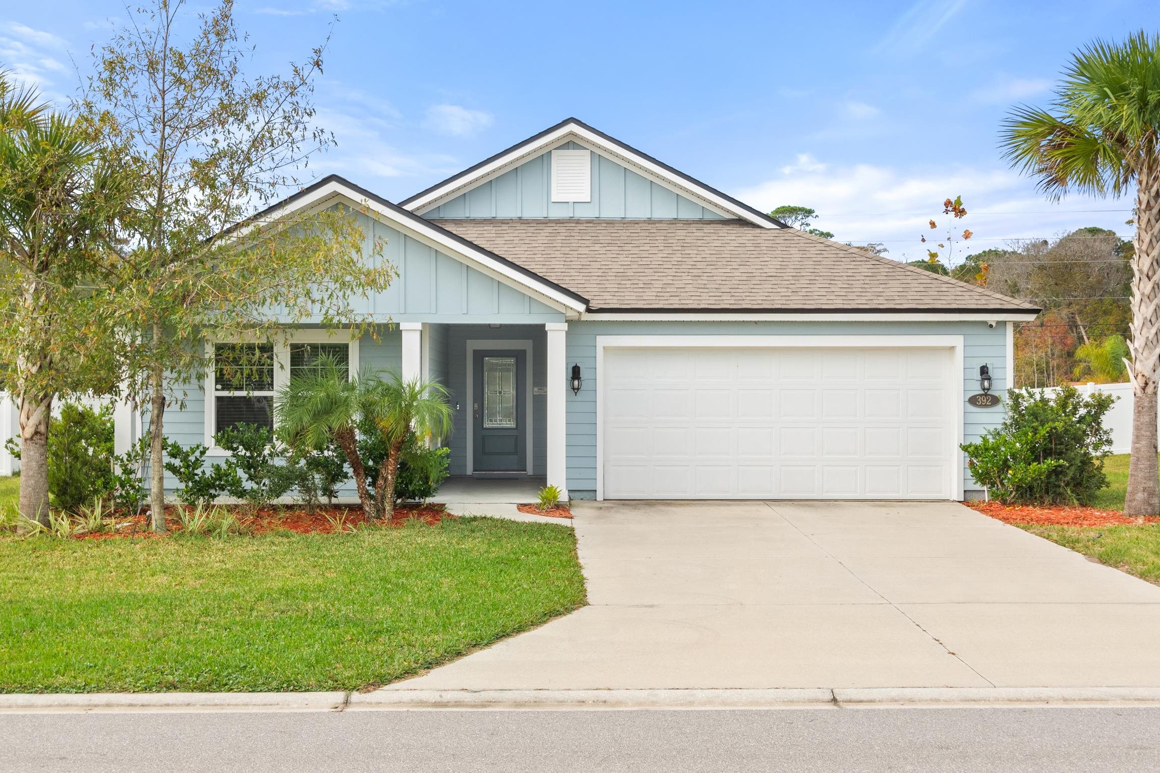 392 South Hamilton Springs Road St. Augustine, FL 32084 - Photo 5 of 29 front view of house with a yard