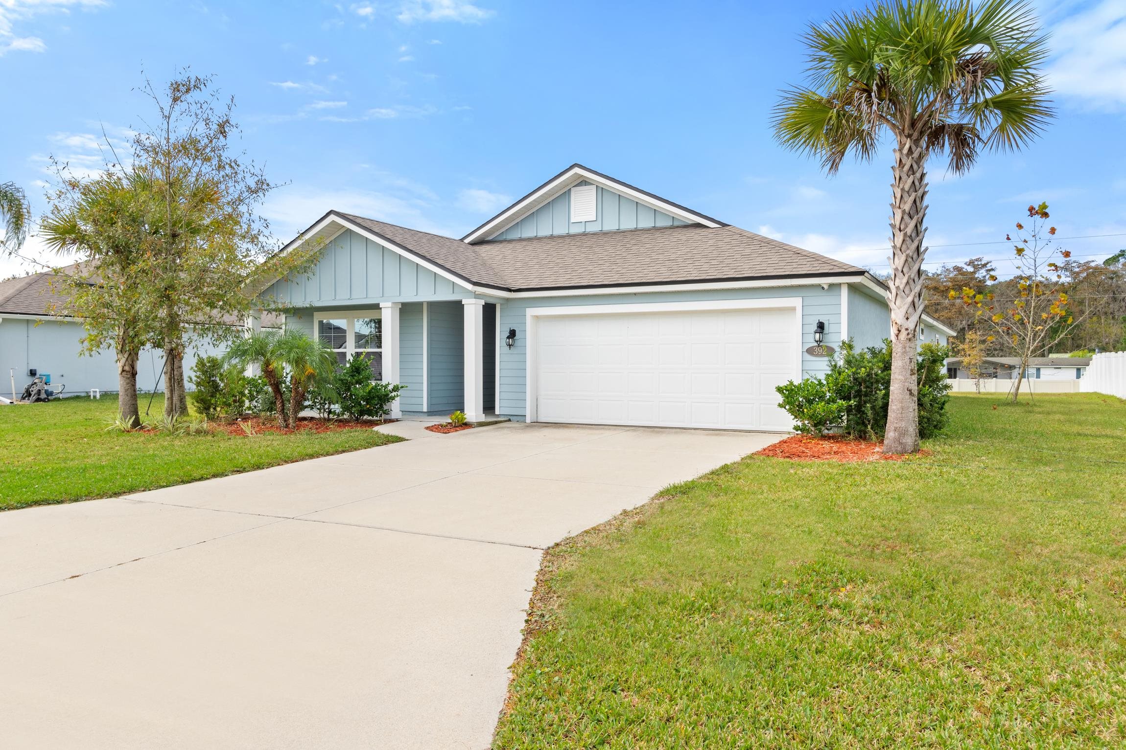 392 South Hamilton Springs Road St. Augustine, FL 32084 - Photo 6 of 29 a front view of house with yard and green space