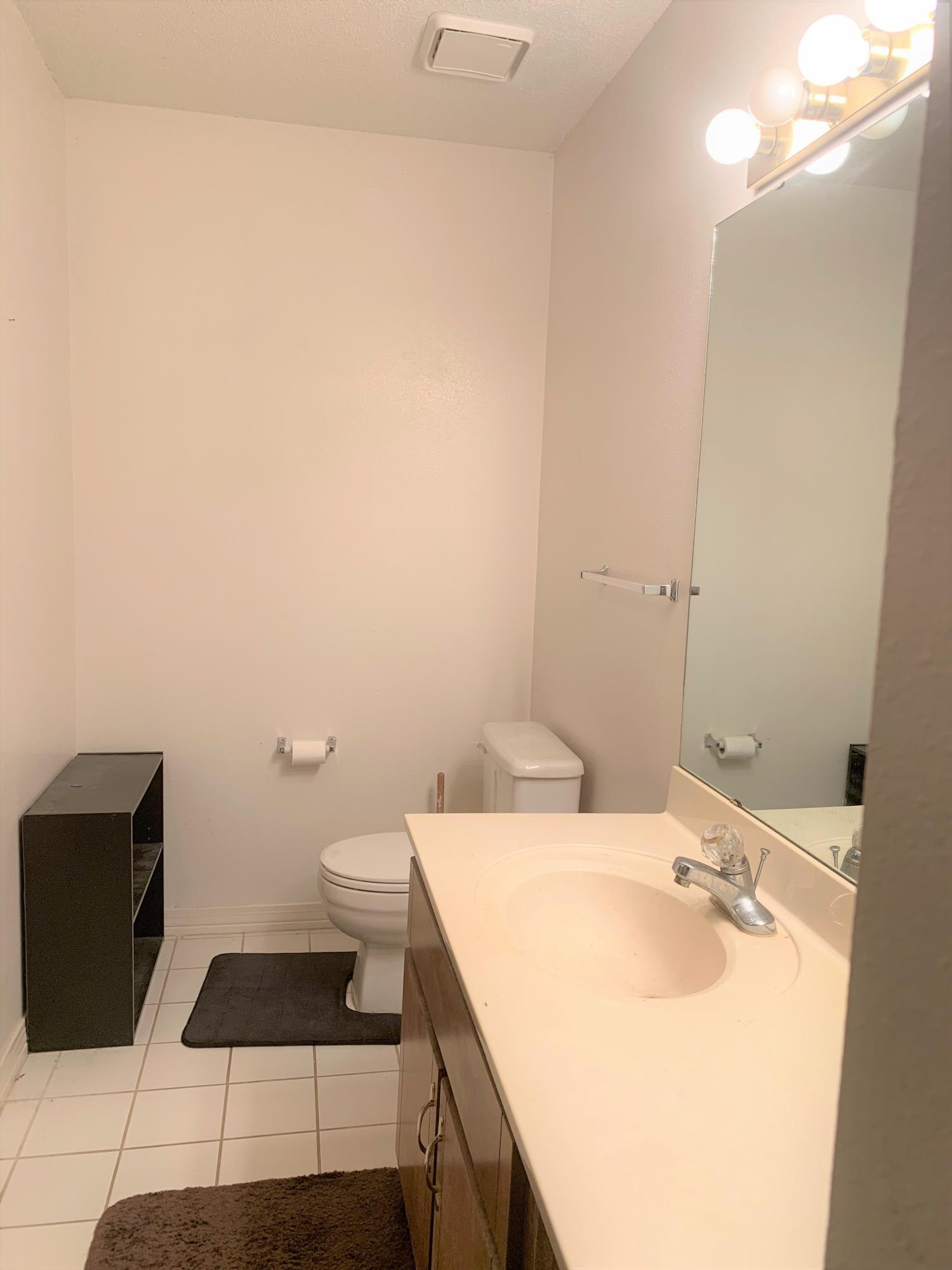 2807 Ping Lane Crestview, FL 32539 - Photo 15 of 28 a bathroom with a sink and a toilet