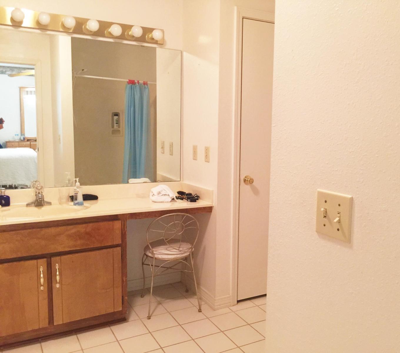 2807 Ping Lane Crestview, FL 32539 - Photo 20 of 28 a bathroom with a sink a toilet and shower