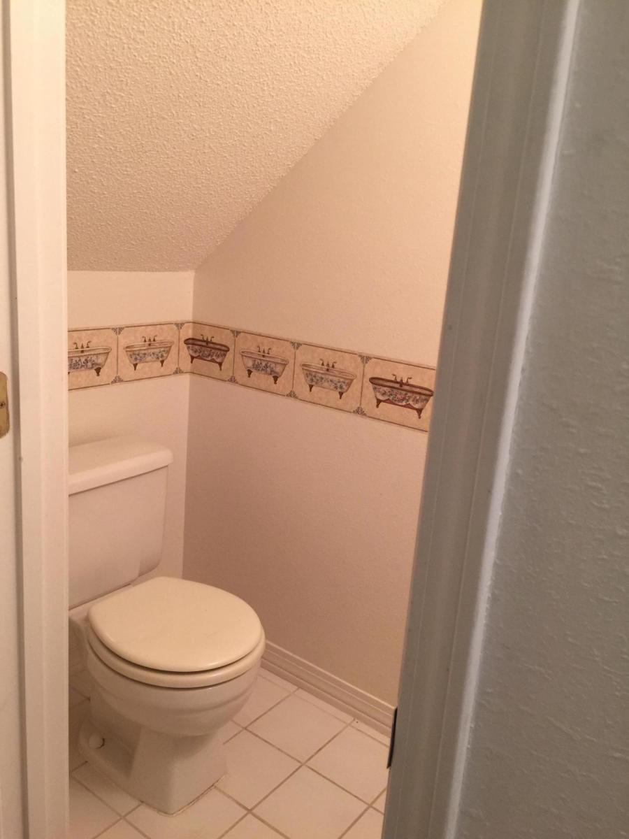 2807 Ping Lane Crestview, FL 32539 - Photo 23 of 28 a bathroom with a toilet and a shower