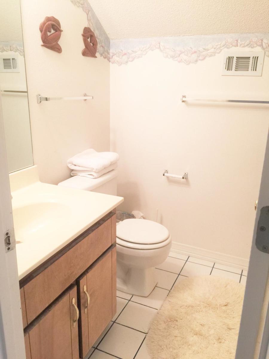 2807 Ping Lane Crestview, FL 32539 - Photo 24 of 28 a bathroom with a toilet and a shower