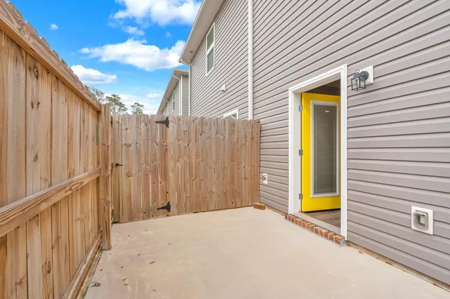 a view of a backyard of a house