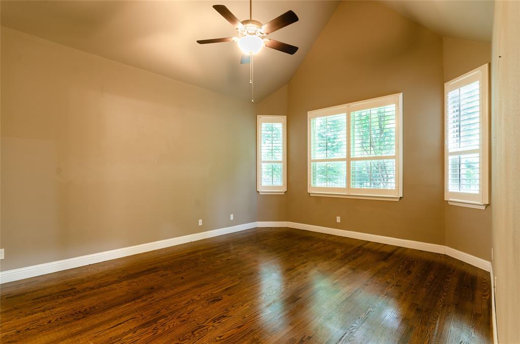 1863 Audubon Pond Way Allen, TX 75013 - Photo 20 of 40 a view of an empty room with wooden floor and a window