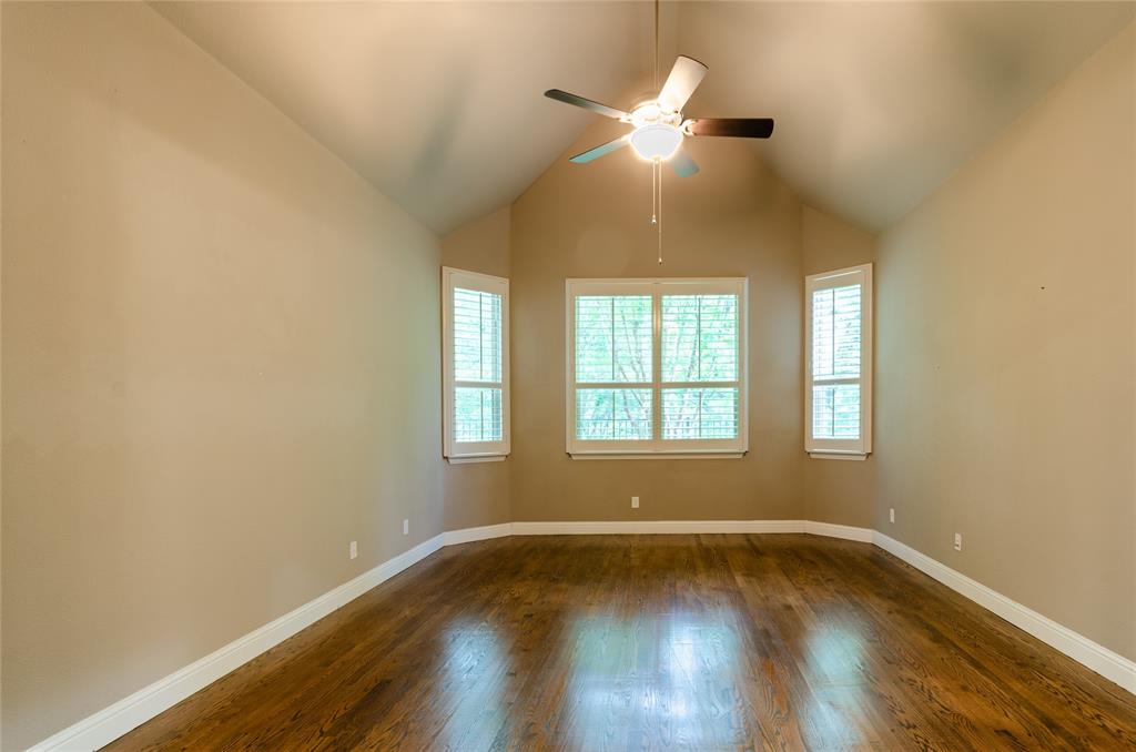1863 Audubon Pond Way Allen, TX 75013 - Photo 21 of 40 an empty room with wooden floor and windows