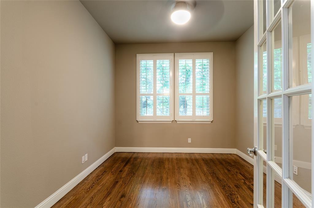 1863 Audubon Pond Way Allen, TX 75013 - Photo 27 of 40 a view of an empty room with wooden floor and a window