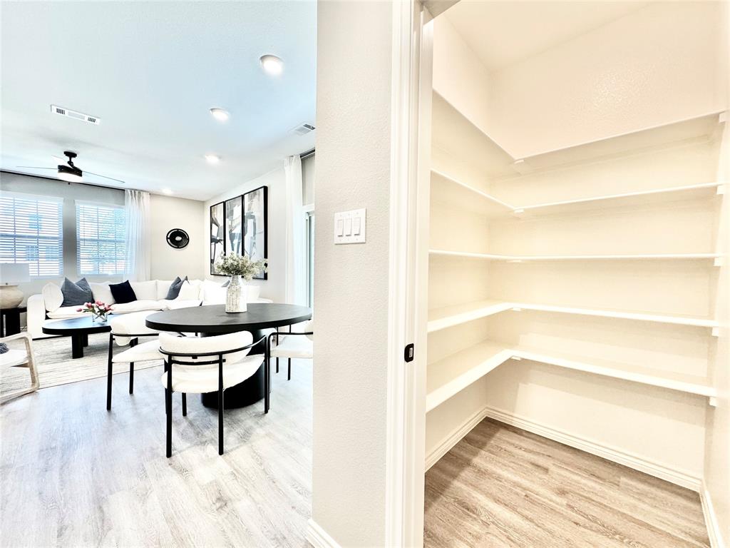 8523 Leyton Road The Colony, TX 75056 - Photo 11 of 39 a view of a bathroom with sink and a bathtub