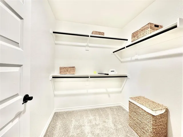 a view of a walk in closet