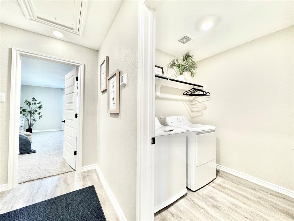 8523 Leyton Road The Colony, TX 75056 - Photo 28 of 39 a bathroom with a sink and a mirror